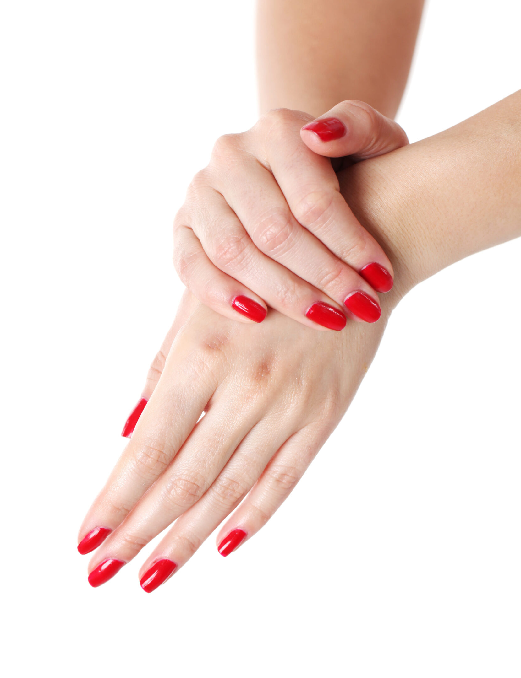 Beautiful woman's hands with red manicure isolated over white background